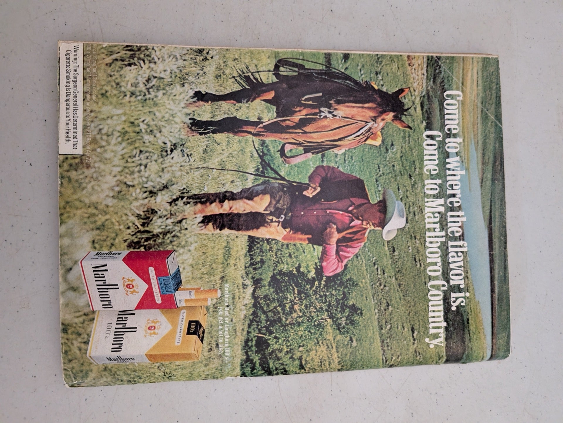 Back cover of vintage 1972 Playboy featuring a Marlboro cigarettes ad