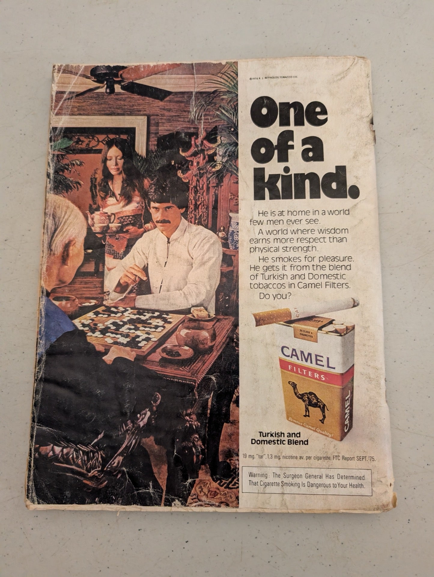 Back cover of vintage 1976 Playboy featuring a Camel cigarettes ad