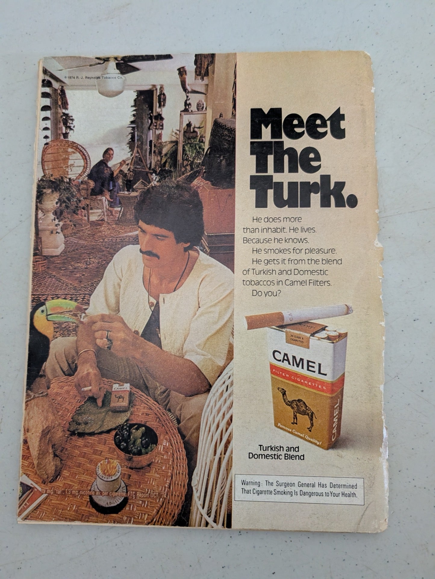 Back cover of vintage 1975 Playboy featuring a Camel cigarettes ad