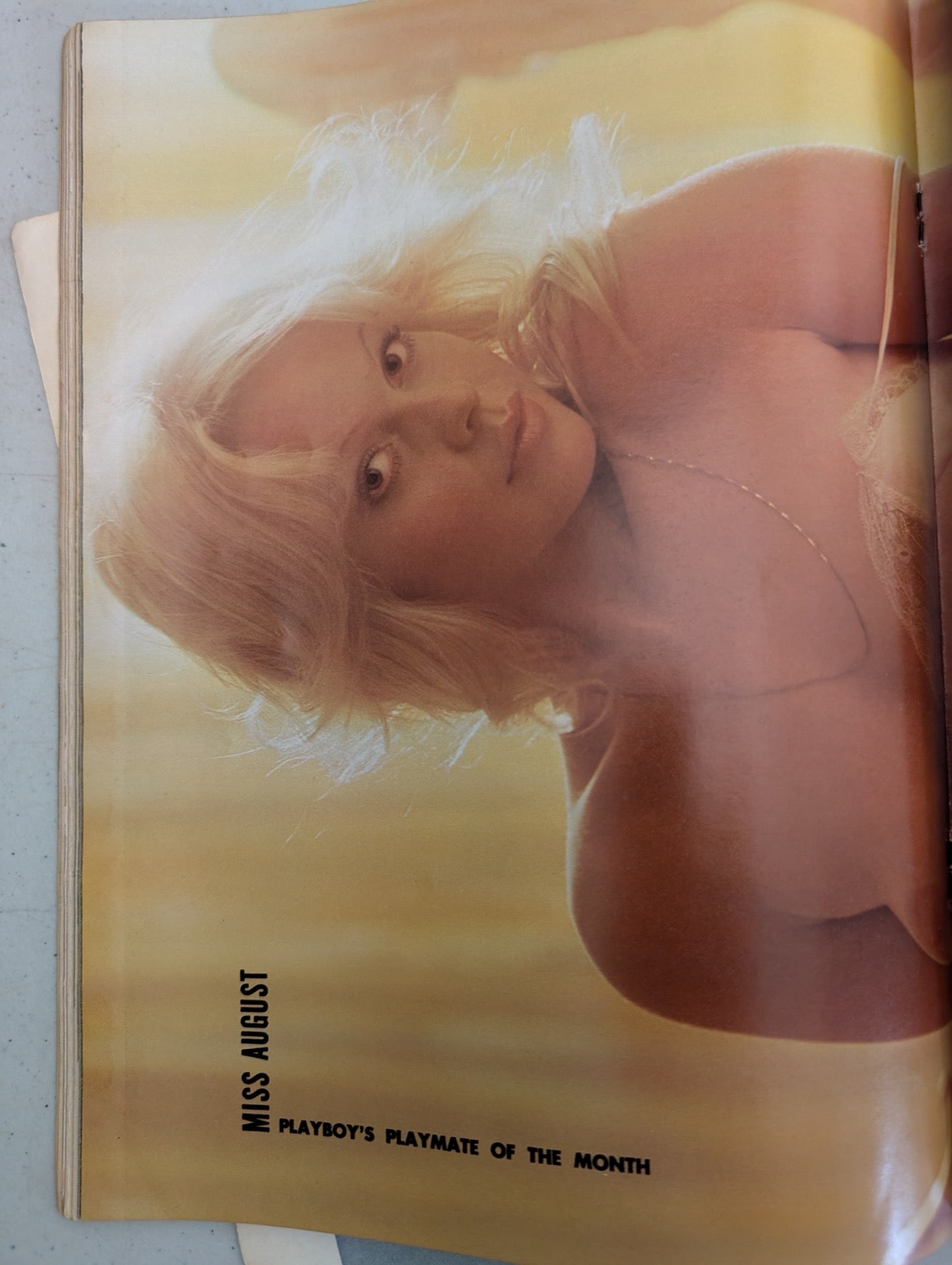 Inside centerfold page view of vintage Playboy magazine