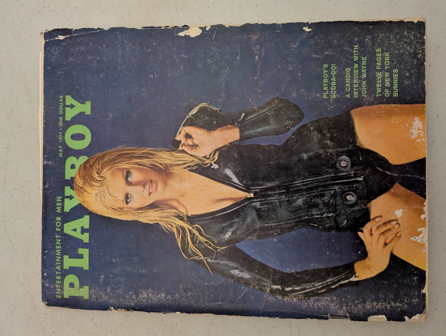 Front cover of vintage May 1971 Playboy Magazine showing wear