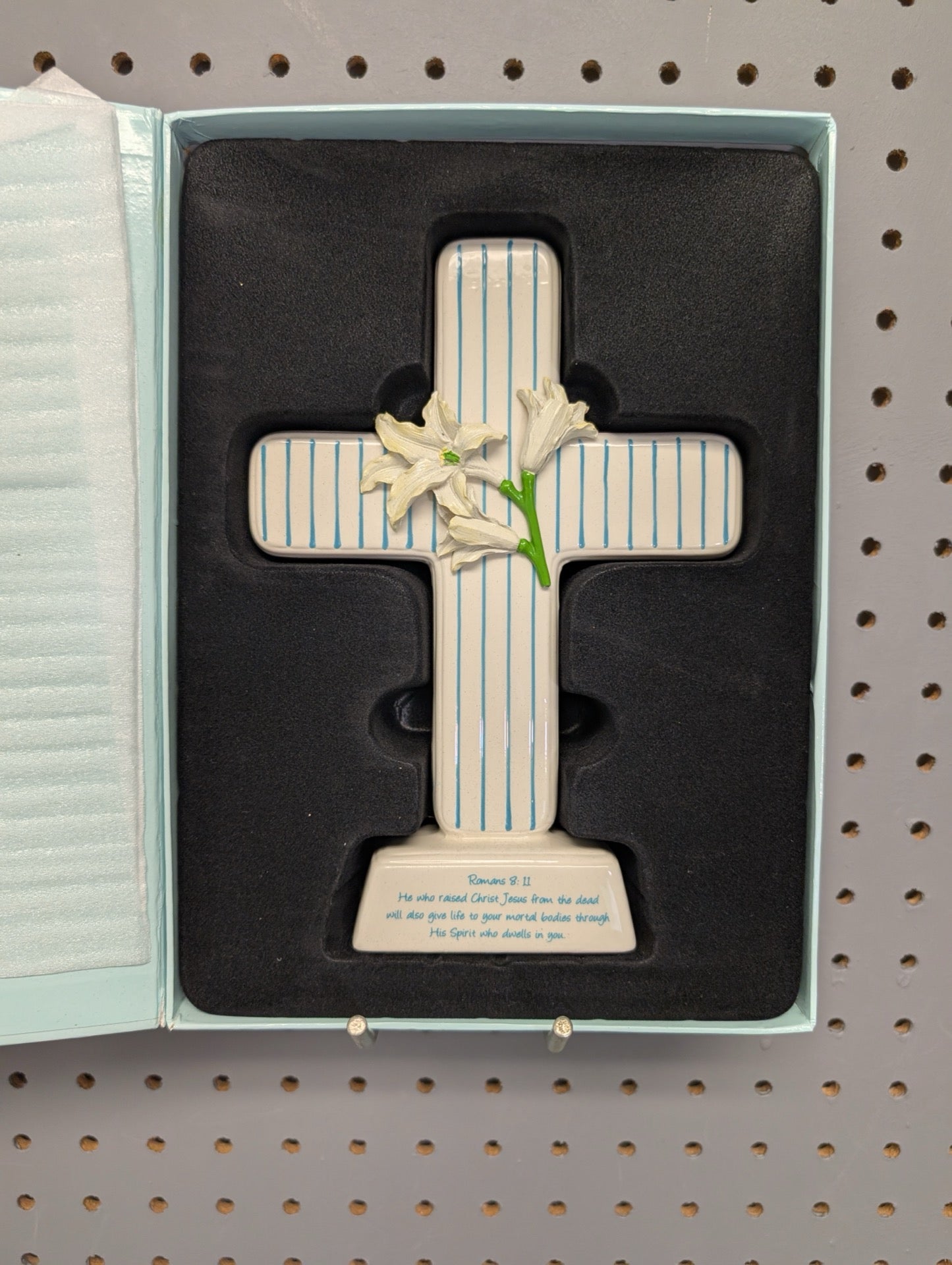 Ceramic Easter cross with lily inside packaging