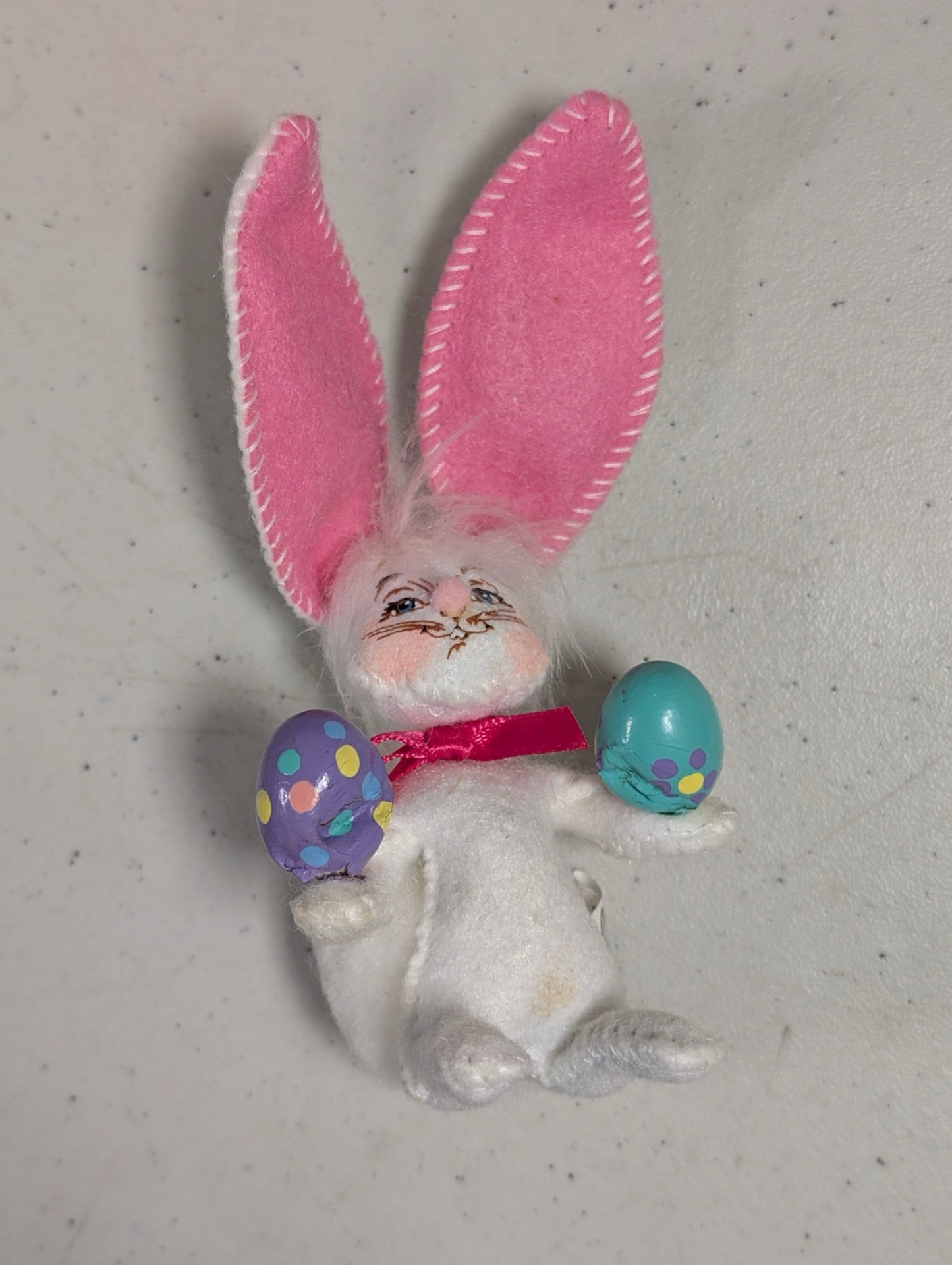 Front view of Annalee bunny laying down with eggs