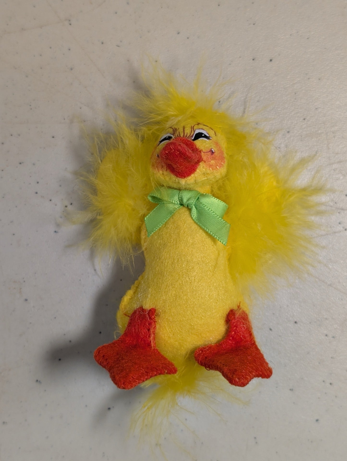 Front view of Annalee yellow duckling chick