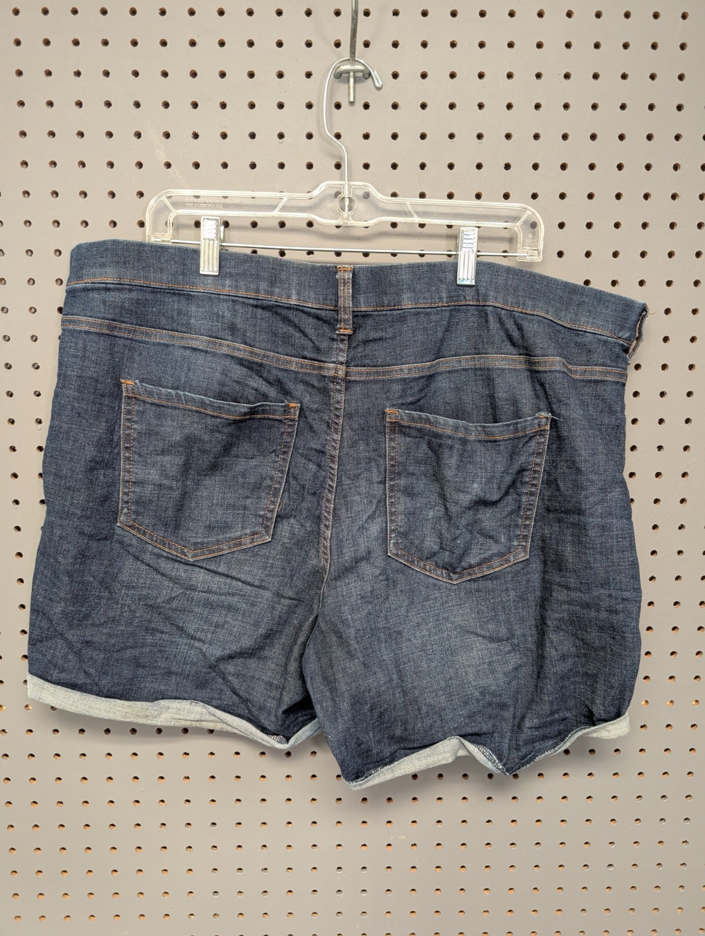 Time and Tru women's dark wash cuffed shorts back view