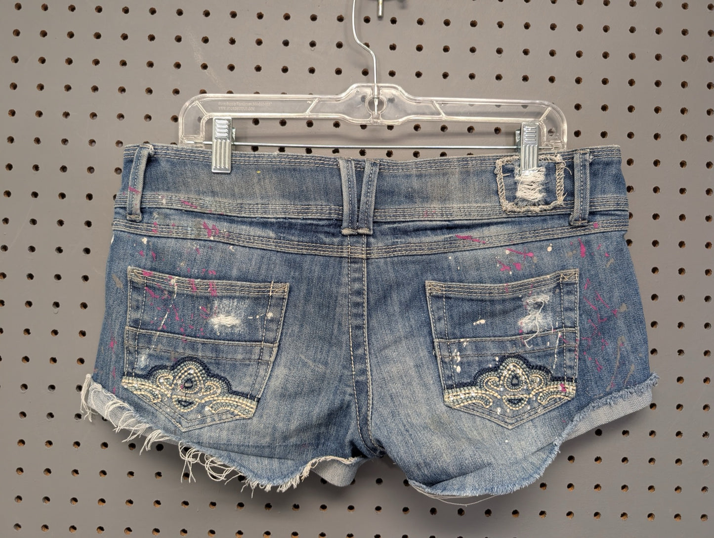 Almost Famous Y2K distressed cutoff shorts back view
