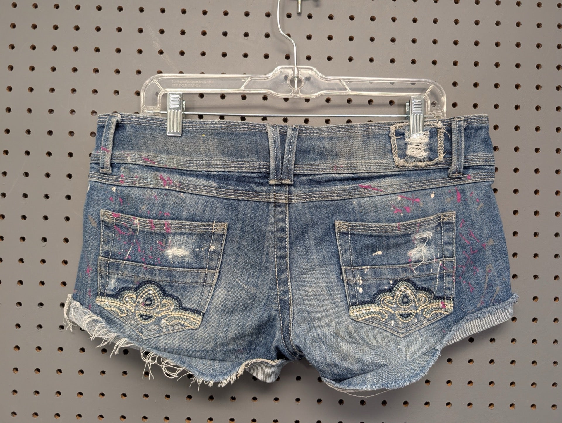 Almost Famous Y2K distressed cutoff shorts back view