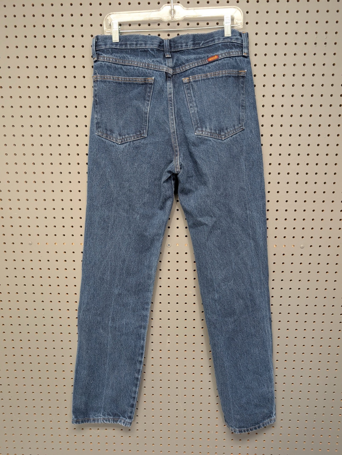Back view of Rustler dark wash jeans