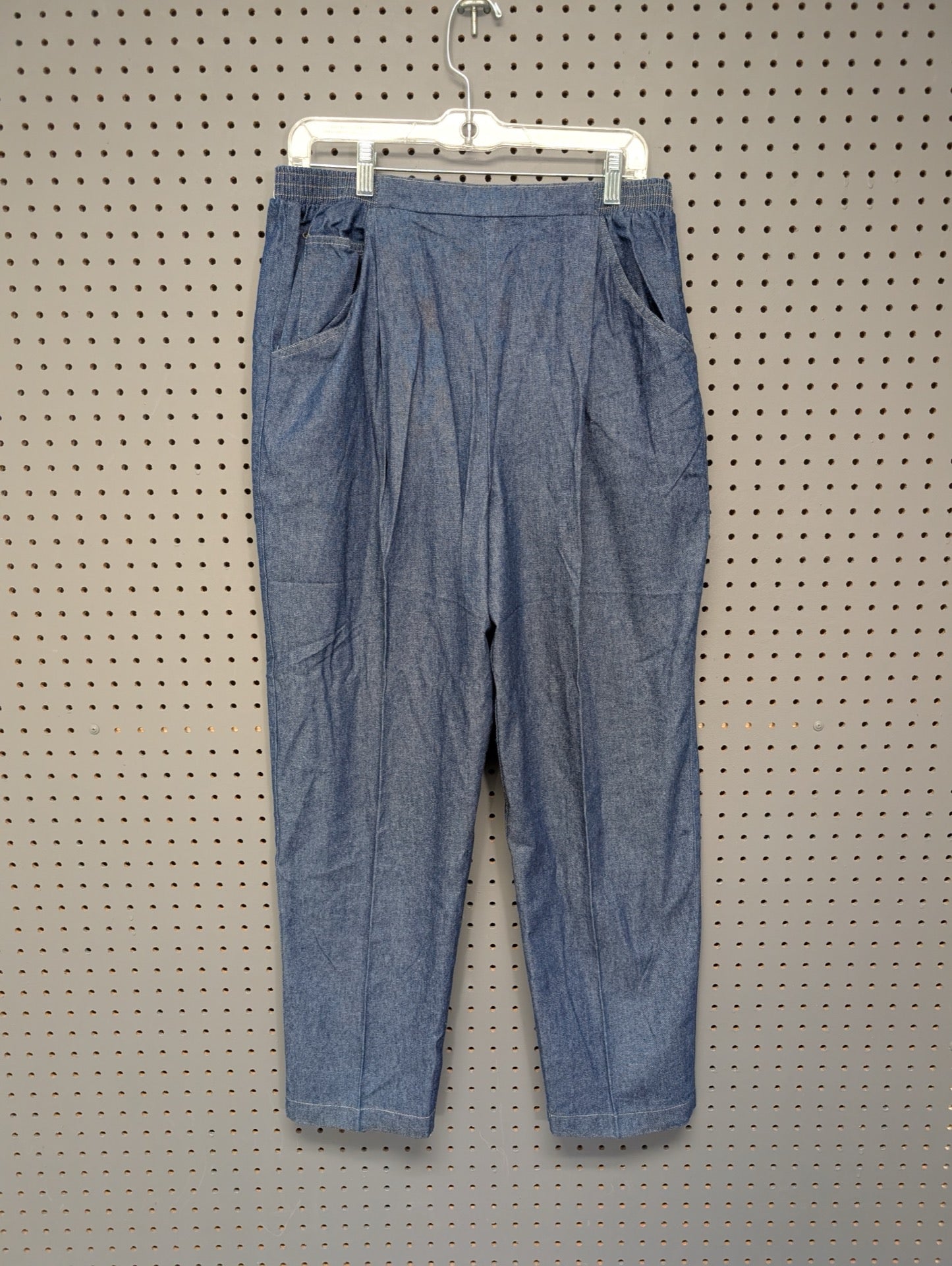 Front view of vintage Tumbleweeds pleated jeans