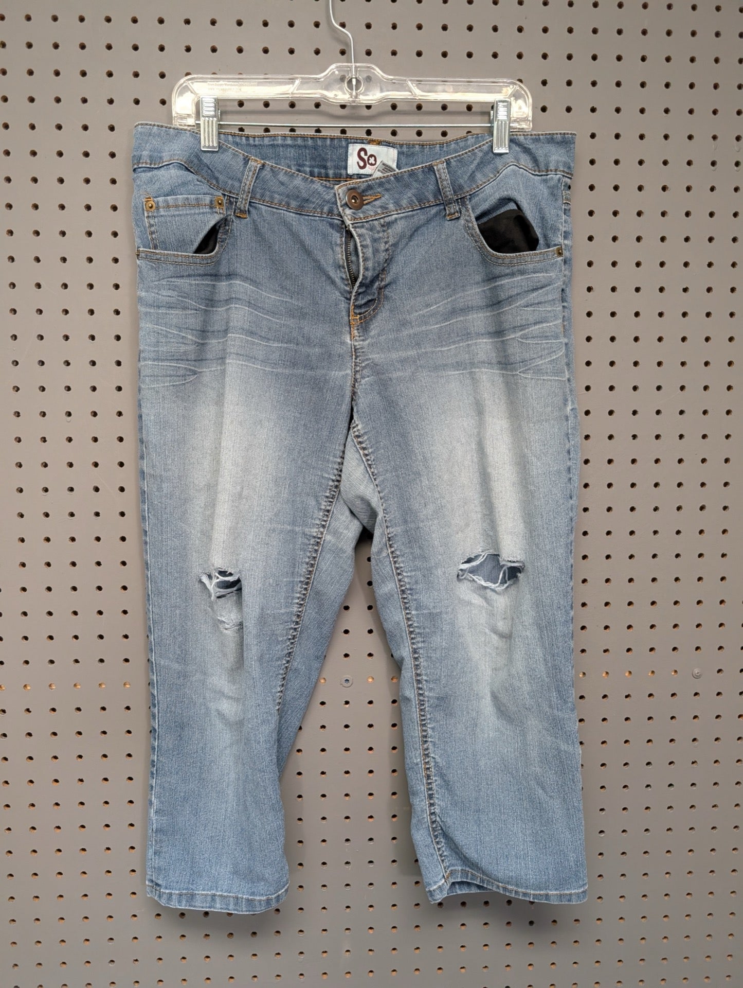 Front of SO size 15 distressed capri jeans