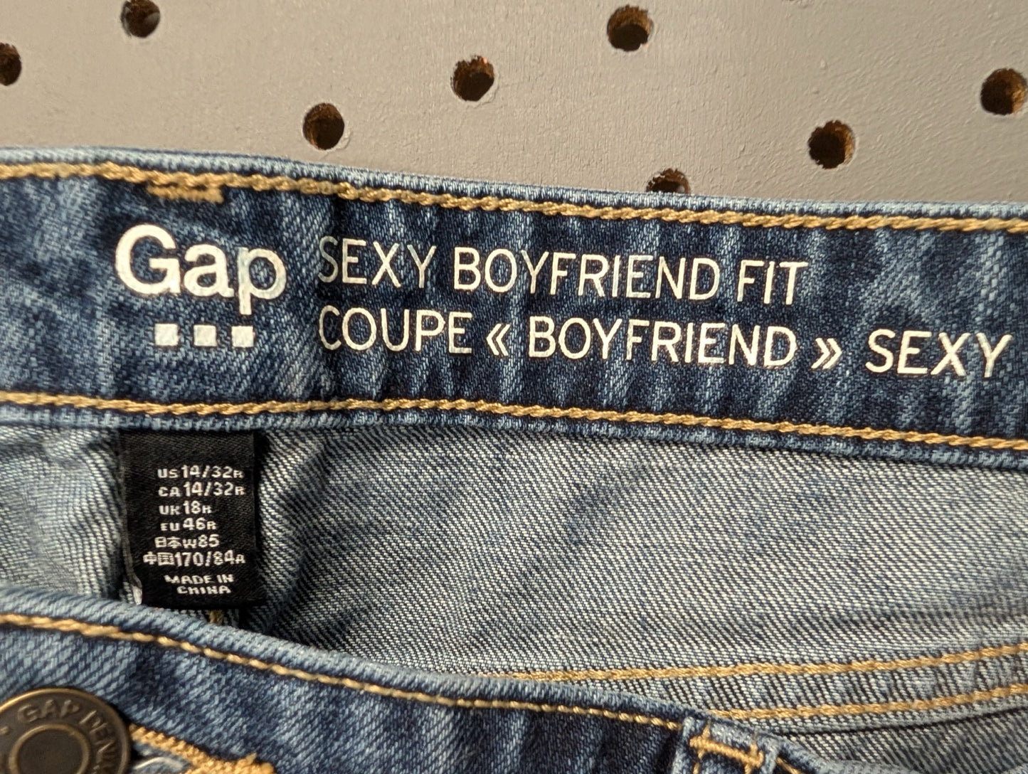 Gap size tag showing 14/32R and Boyfriend Fit