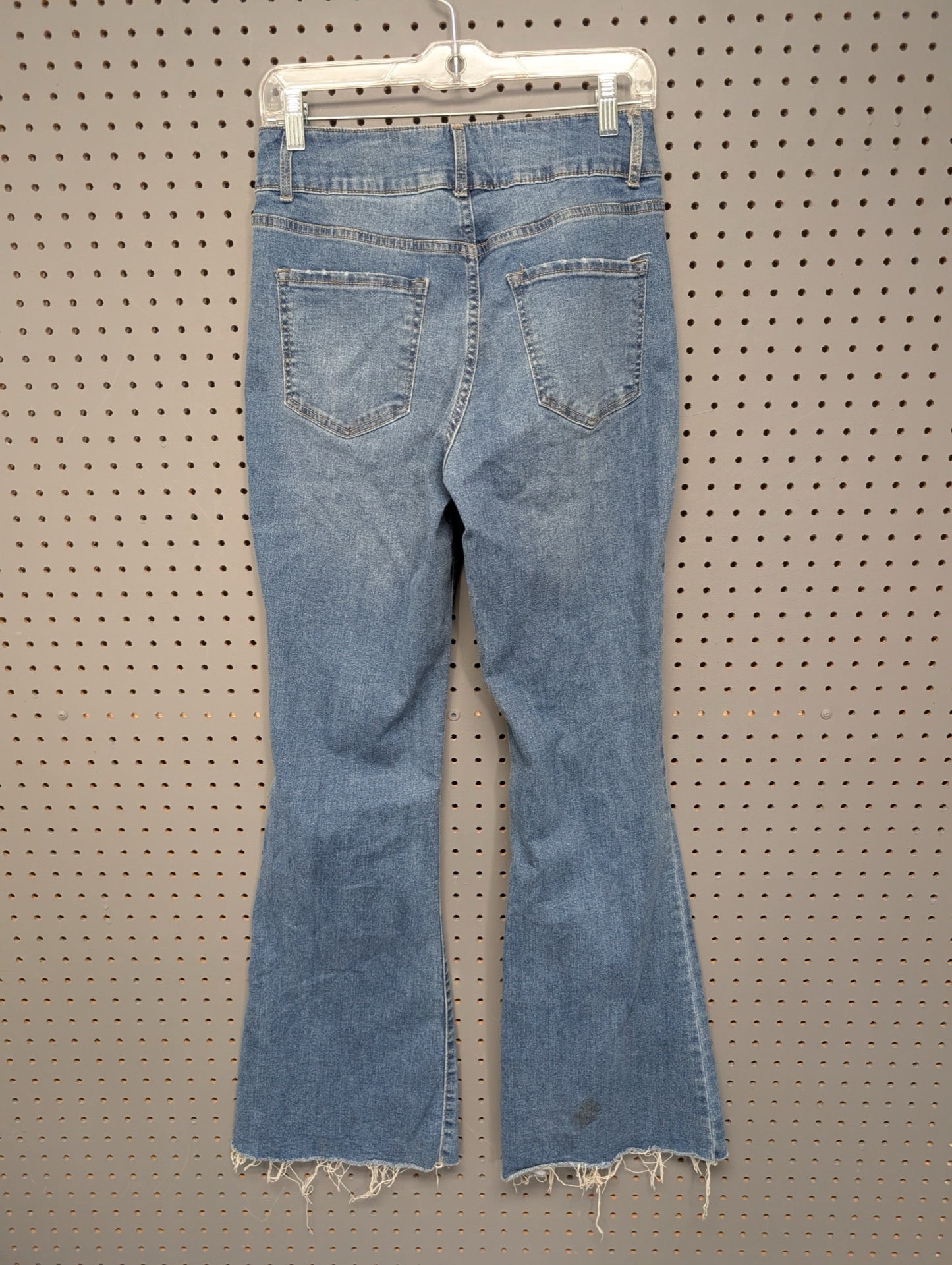 Back view of NOBO raw hem flare jeans