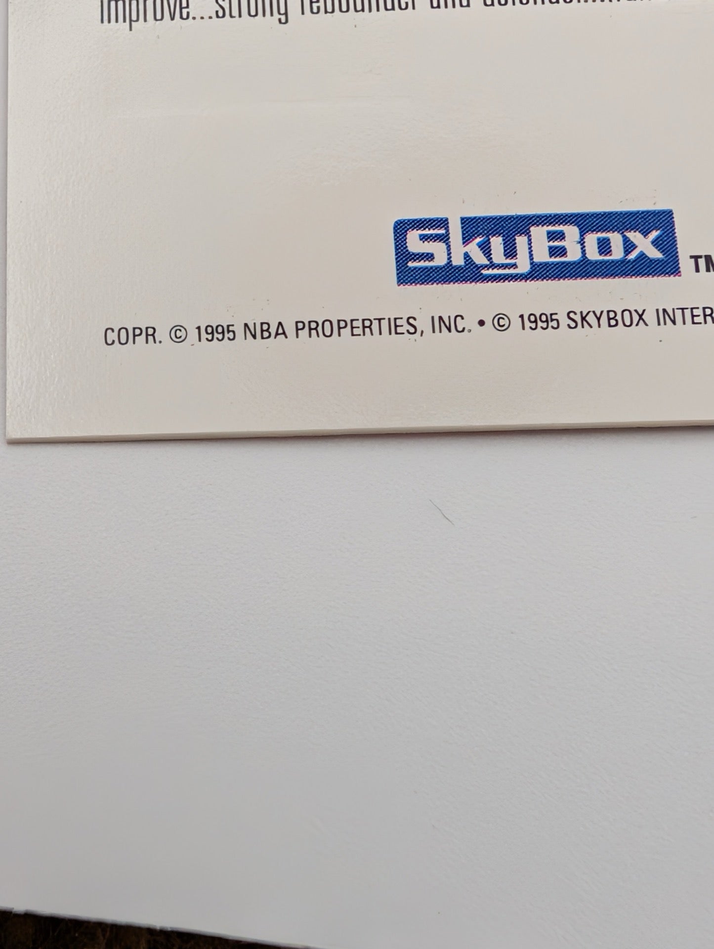 Close up of copyright on 1994-95 SkyBox Premium Grant Hill card