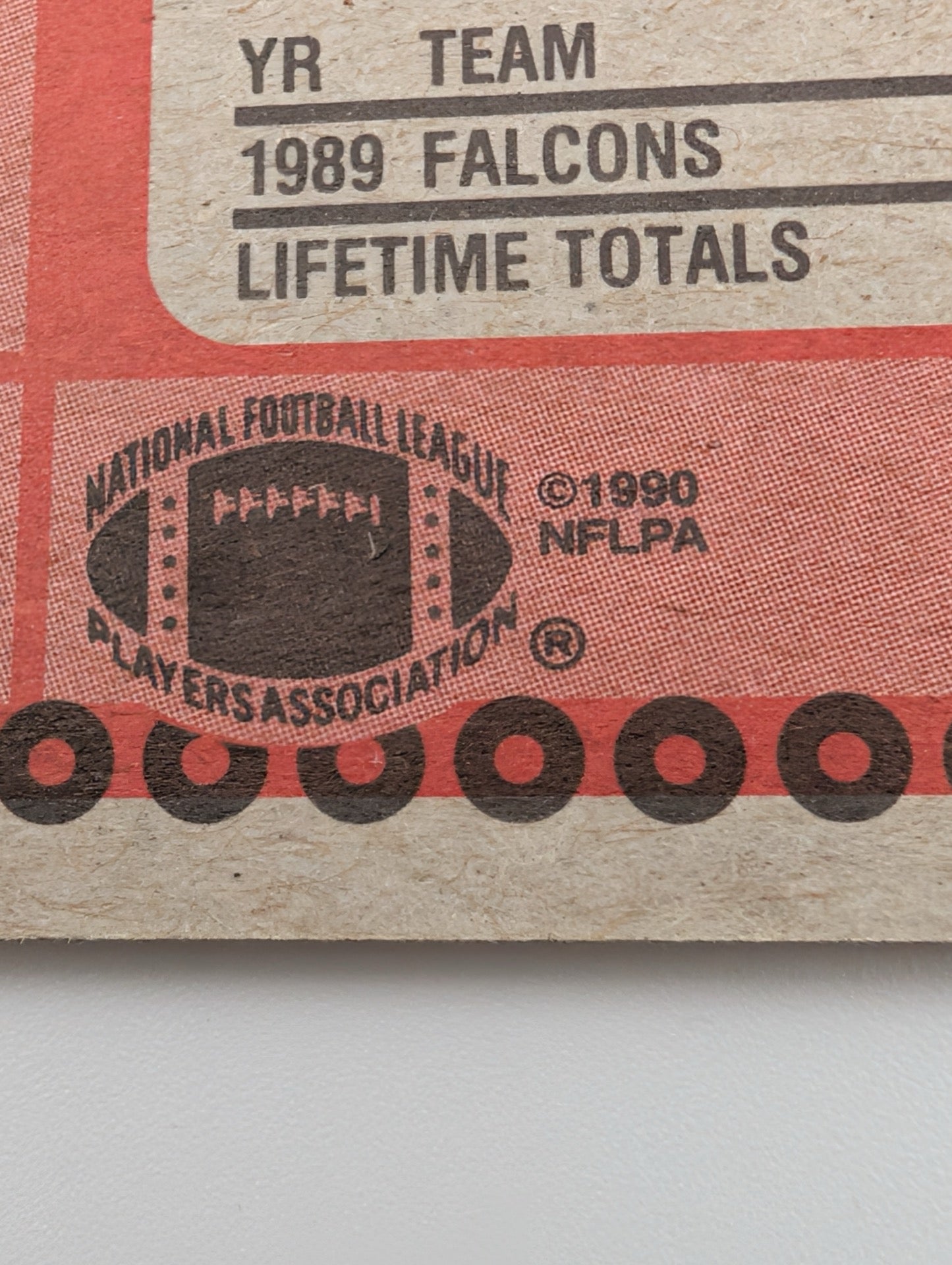 Detail shot of NFLPA logo on back of Deion Sanders card