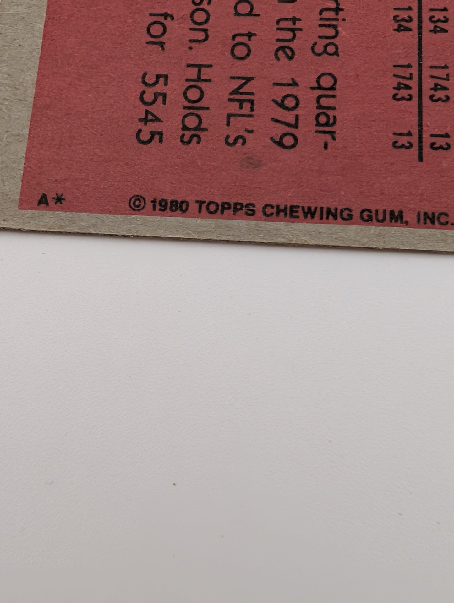 Detail of copyright on 1980 Topps Phil Simms card