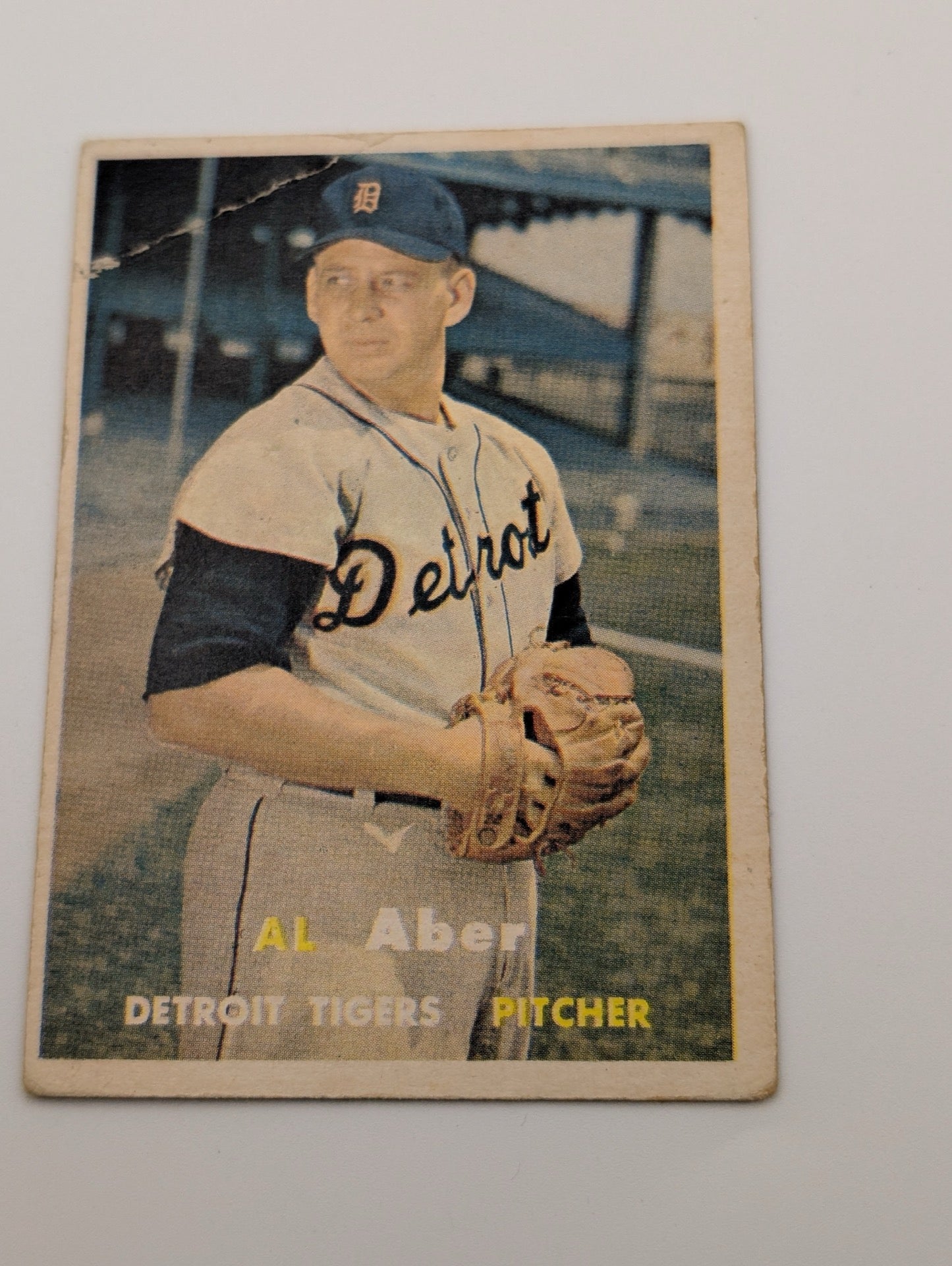 Front of 1957 Topps Al Aber #141 baseball card showing crease