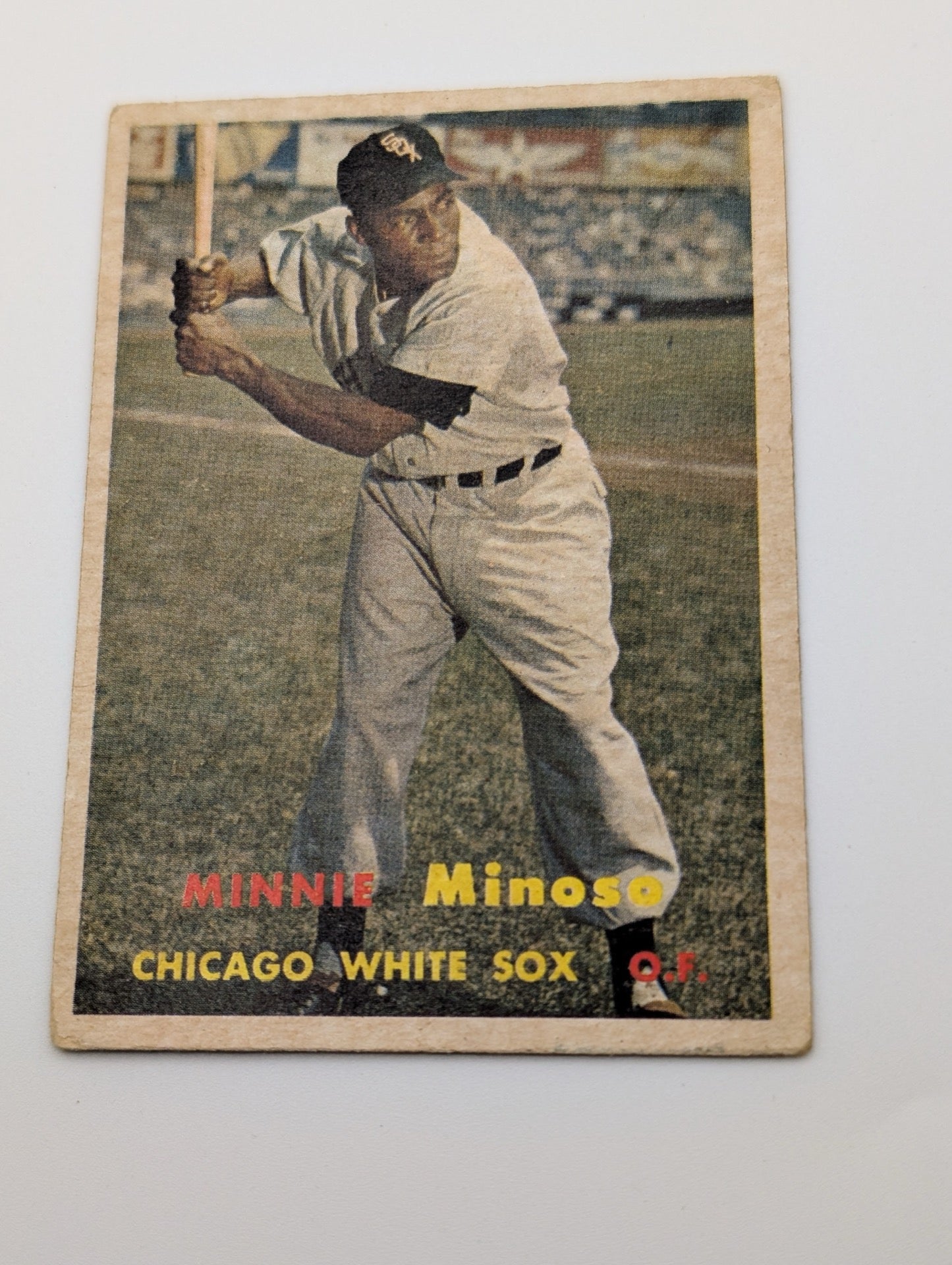 Front of 1957 Topps Minnie Minoso #138 baseball card