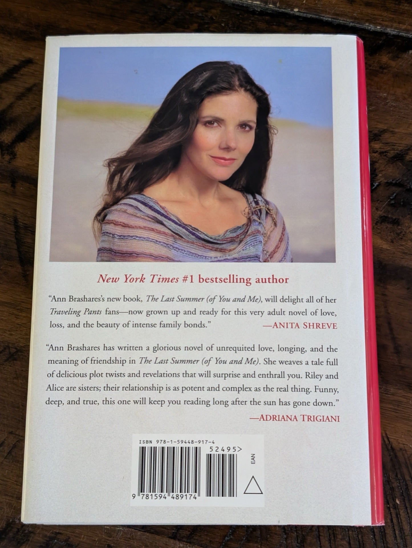 Back cover with author photo and reviews