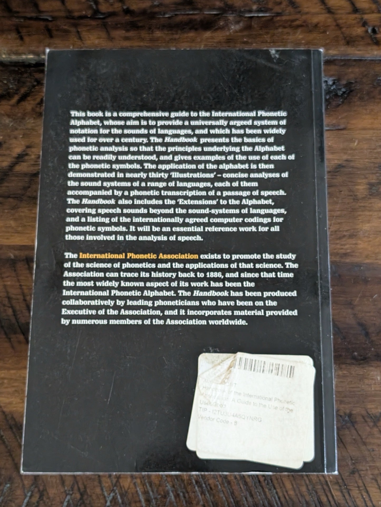 Back cover showing synopsis and sticker