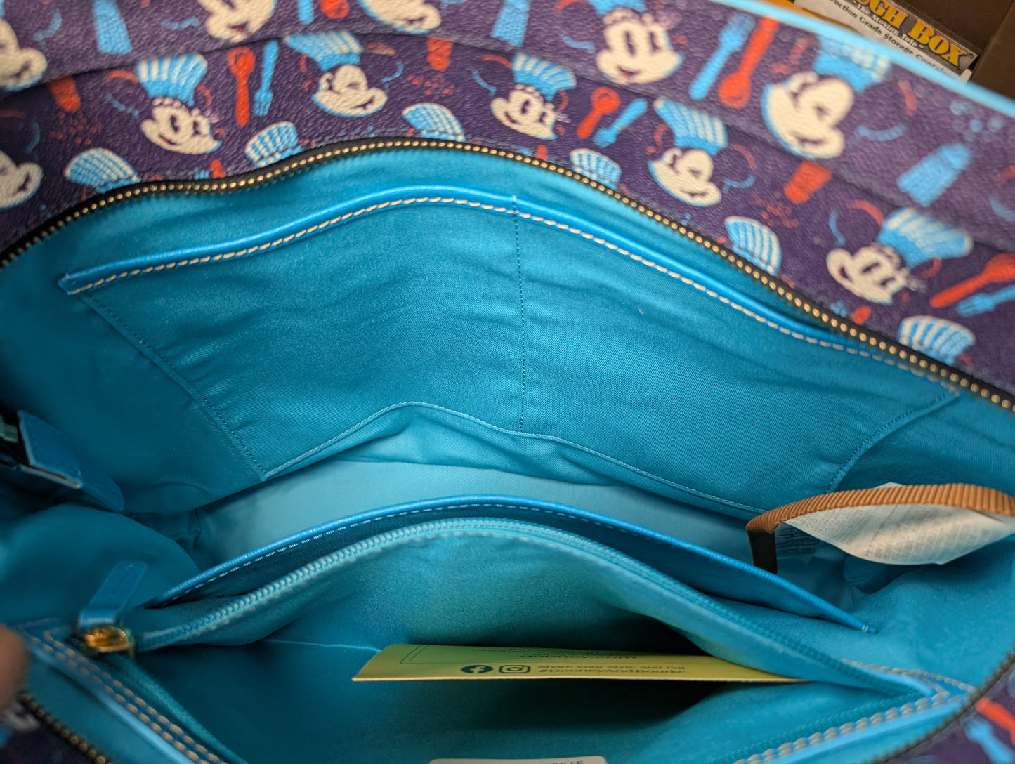 Epcot International Food & Wine Festival 2023 Tote Bag from Dooney & Bourke - 2023 Handbag (Coated Cotton, Leather Tote Bag, Disney Characters, Food, Epcot, Navy Blue, Bright Blue)